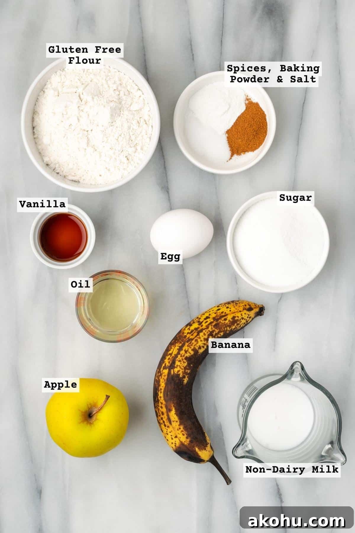 Apple Banana Muffins Recipe for Moist, Fluffy Bites 3 Ingredients for apple banana muffins on a white marble table.