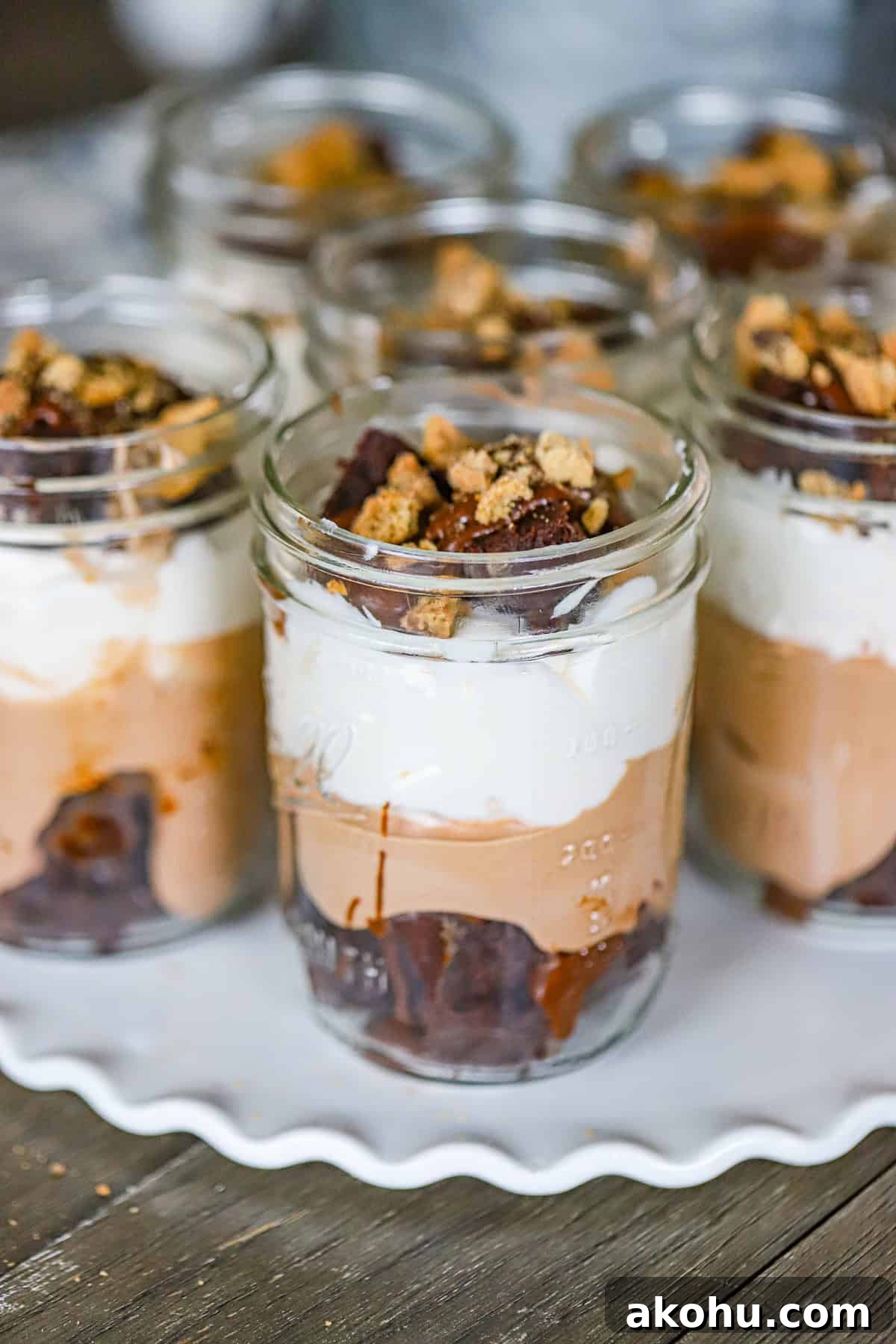 Hershey’s Frosting Brownie Parfaits Recipe for Chocolate Lovers 3 Easy no bake brownie parfaits topped with chocolate frosting and mini chocolate chips