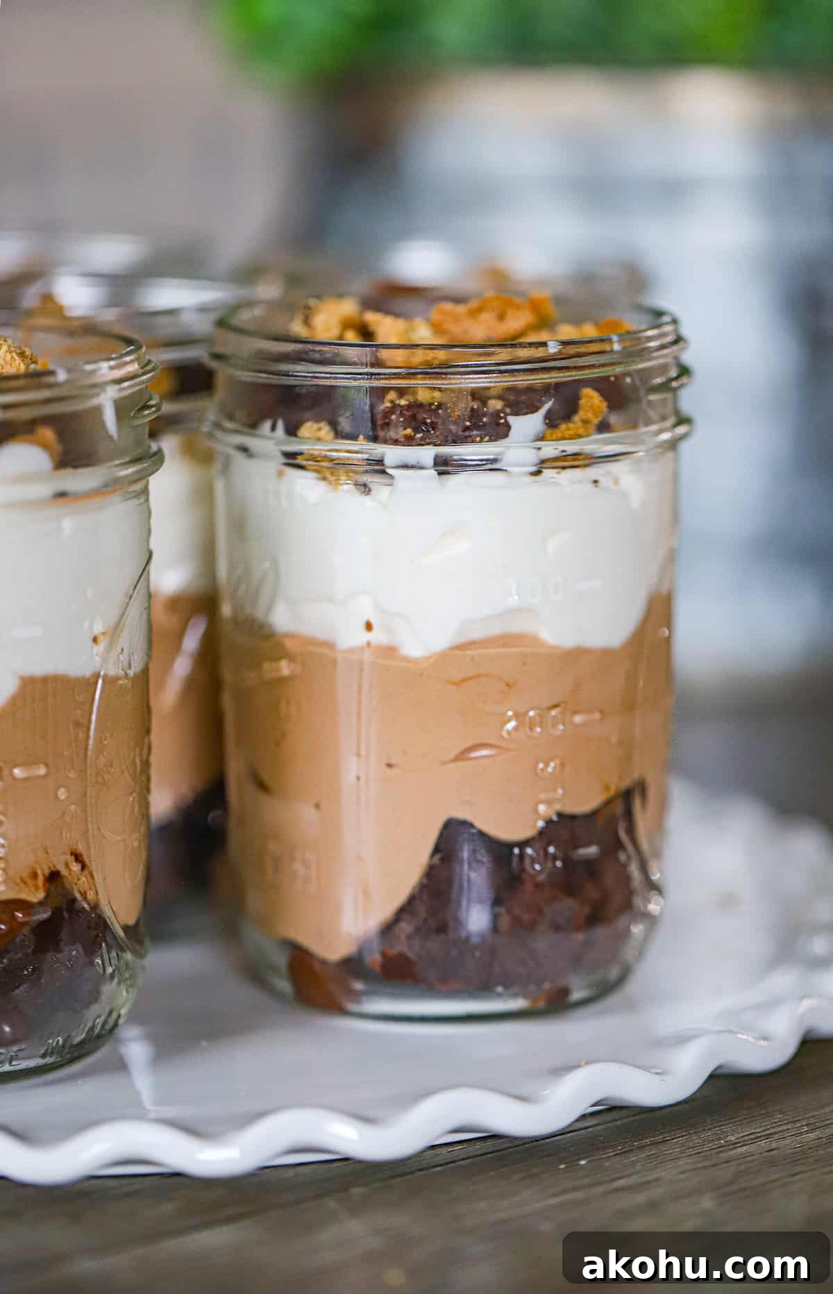 Hershey’s Frosting Brownie Parfaits Recipe for Chocolate Lovers 7 Tall glass of chocolate mousse trifle with brownie chunks and whipped topping