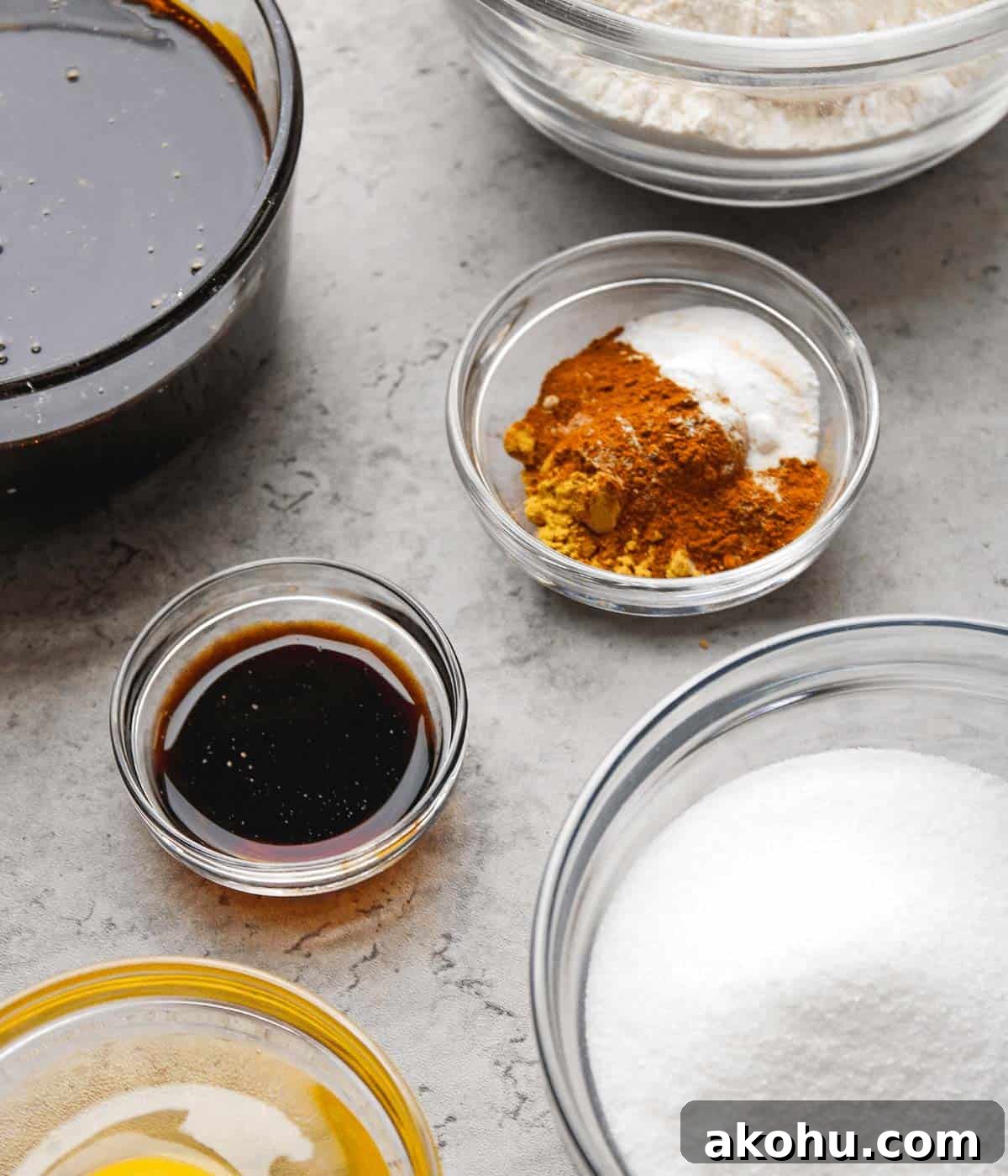 Ingredients in individual bowls for gingerbread loaf recipe.  
