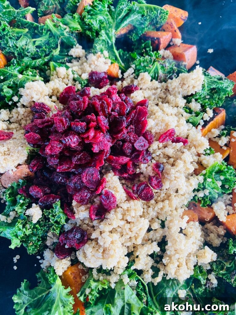 adding the quinoa and cranberries