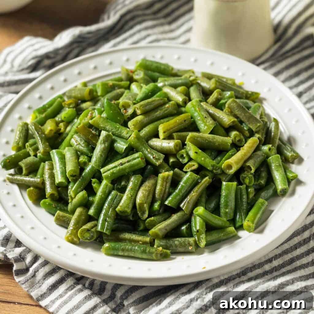 sautéed canned green beans on white plate