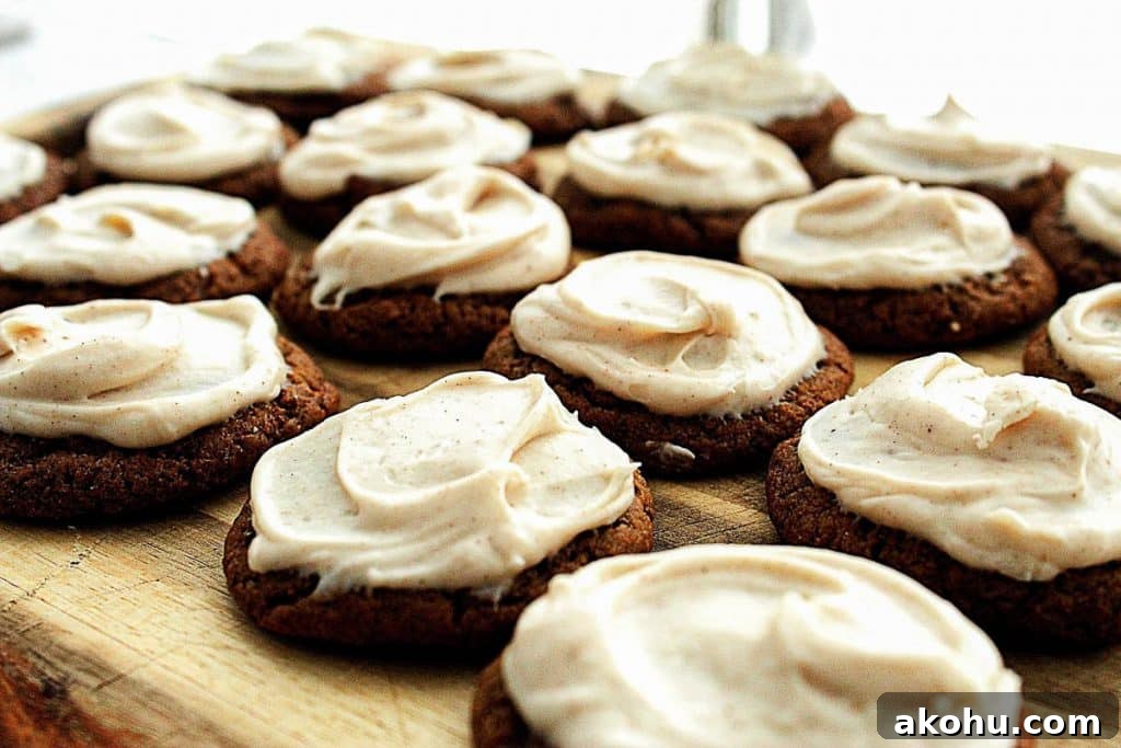 Cookies topped with browned butter cream cheese frosting showing creamy brown butter frosting texture on baked desserts.