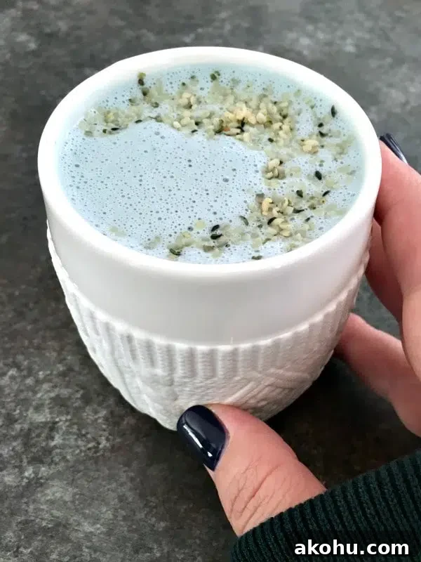 pale blue vanilla mint cashew milk in a white mug