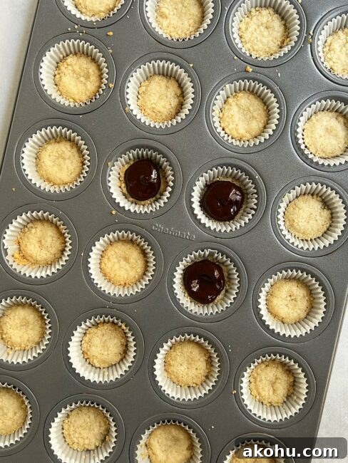 Applying the chocolate lining for individual key lime pies.