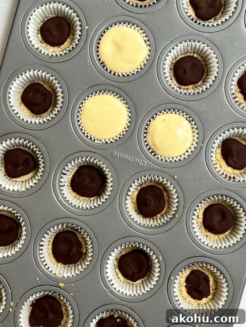 Filling added to some of the chocolate-lined mini key lime crusts.