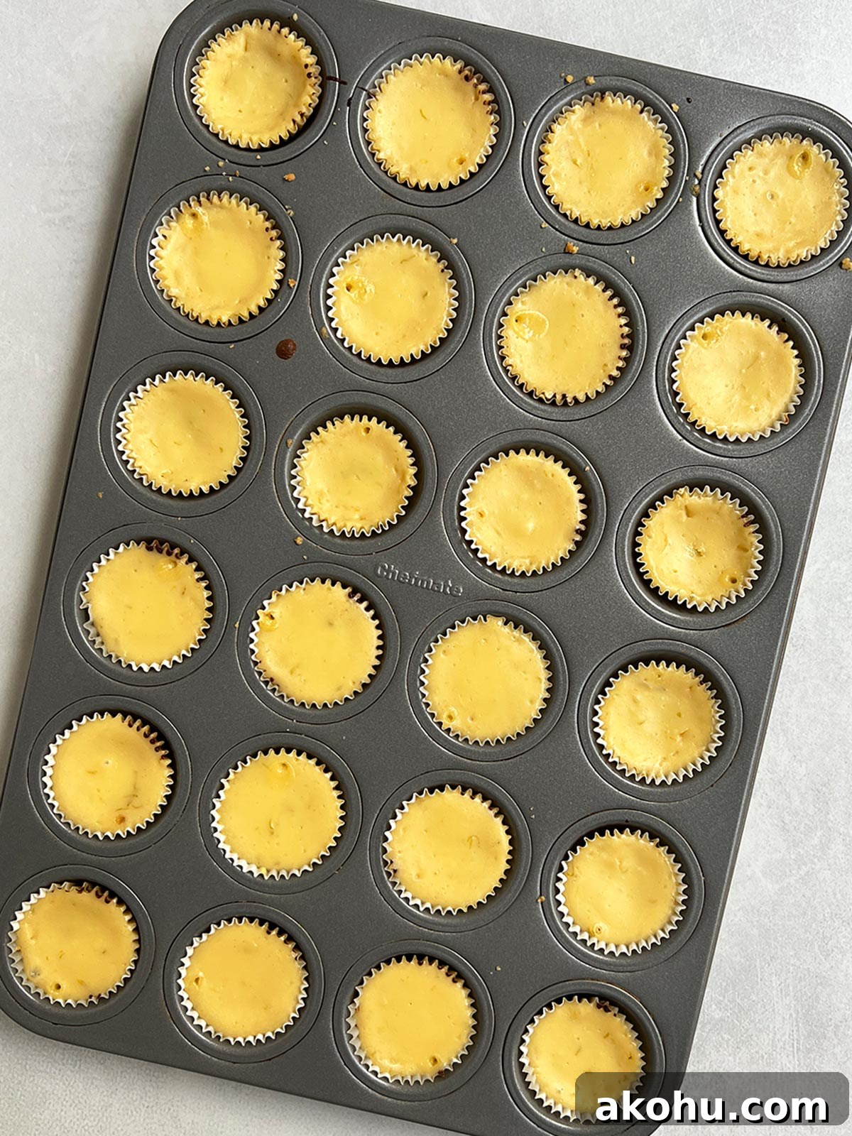 Mini key lime pie bites baked and still in cupcake pan.
