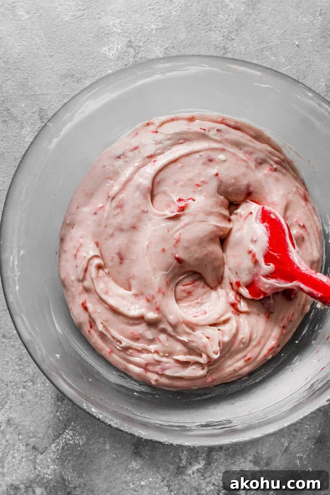 strawberry sheet cake frosting in bowl