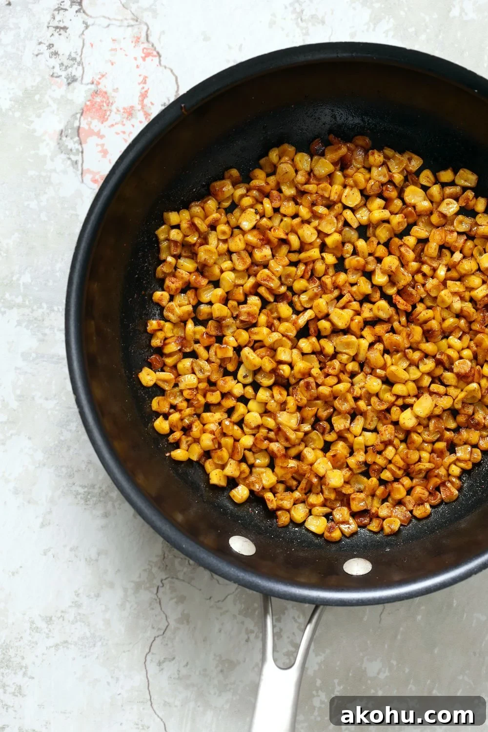 Roasted corn in a black skillet