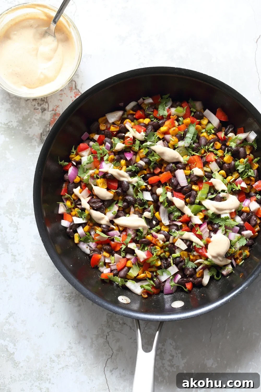 Mexican Street Corn Salad with Black Beans and Chipotle Mayo in a bowl