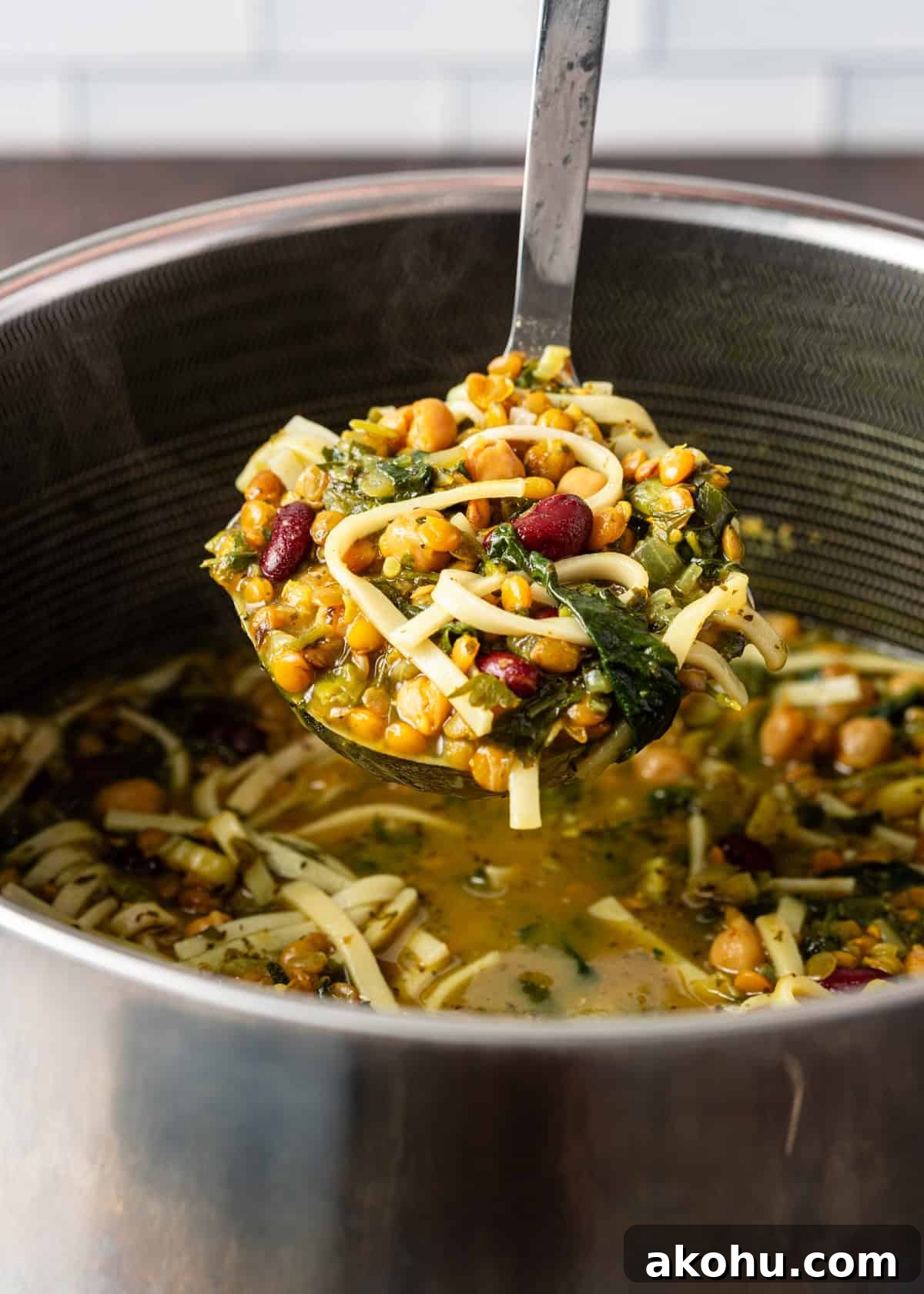 closeup: a ladle full of my ash reshteh recipe