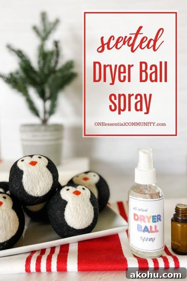 penguin dryer balls in tray in front of evergreen plant -- net to dryer ball spray bottle and essential oil bottles -- 'scented dryer ball spray' by oneessentialcommunity.com