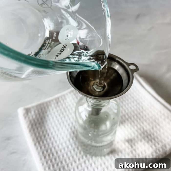 adding water to spray bottle
