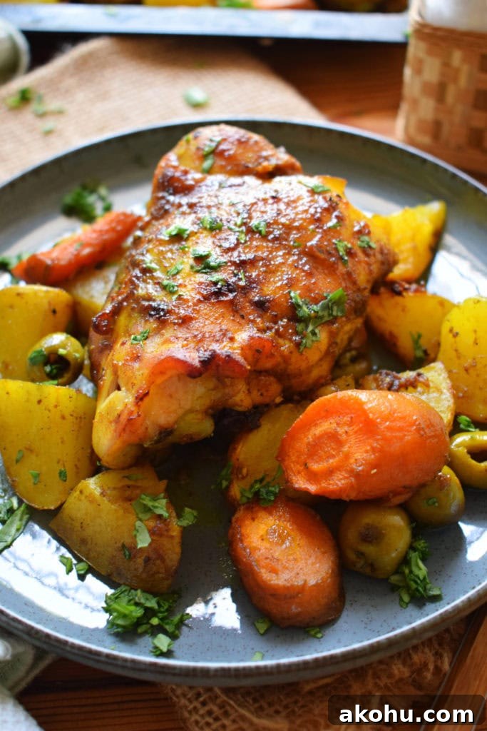 Moroccan chicken and vegetables on a plate.