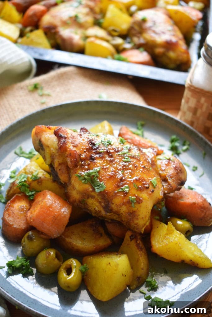 Moroccan chicken and vegetables on a plate.