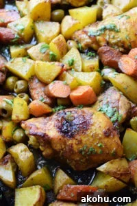 Close up of the Moroccan chicken dinner on a sheet pan.