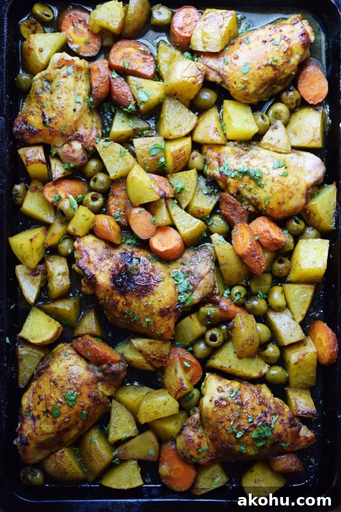 Moroccan sheet pan chicken dinner on a sheet pan.