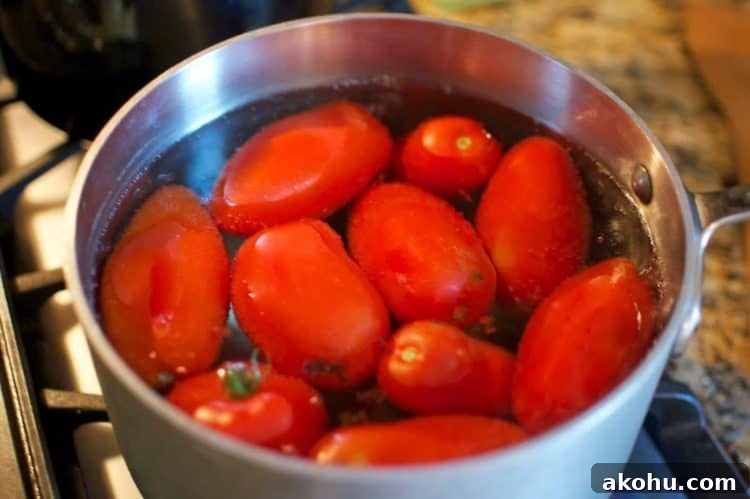 Baked Eggplant in Fresh Basil Marinara Sauce 5 A pot of Roma tomatoes in water