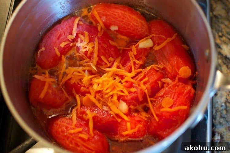 Baked Eggplant in Fresh Basil Marinara Sauce 7 A closeup of Roma tomatoes in a pot