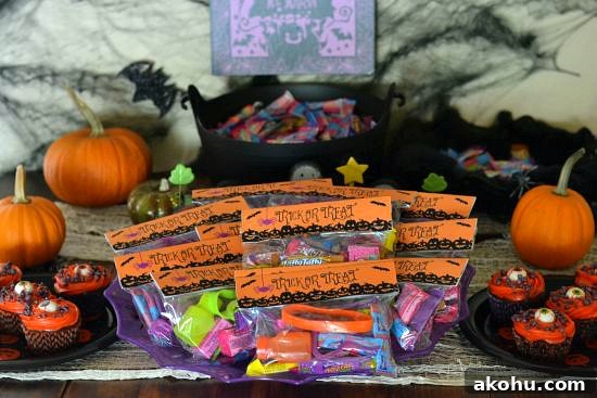 Ultimate Pumpkin Carving Gift Guide for Fall Enthusiasts 4 Halloween Treat Bags for the trick or treaters. on a Halloween decorated table