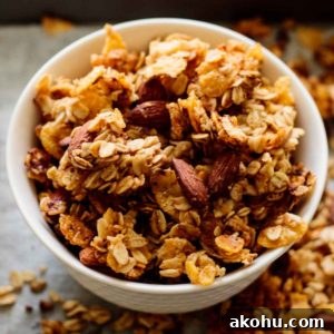 Crunchy Cornflake Granola Cereal Recipe for Breakfast 6 white bowl full of baked cornflakes cereal granola