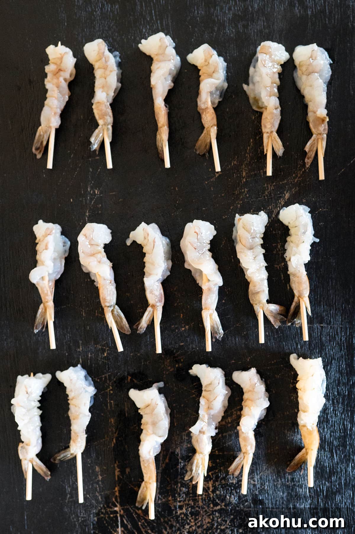 18 raw shrimp with skewers so they're straight.