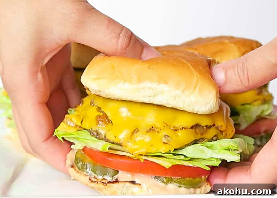 picking up one of the In-N-Out Copycat Double-Double Animal-Style Burger