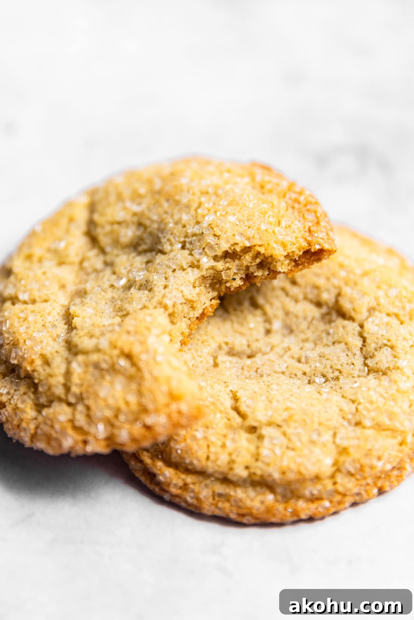 Drop-Style Vanilla Sugar Cookies: Quick Classic Recipe 4 Close up of vanilla sugar cookie with a bite missing showing soft and chewy cookie interior.