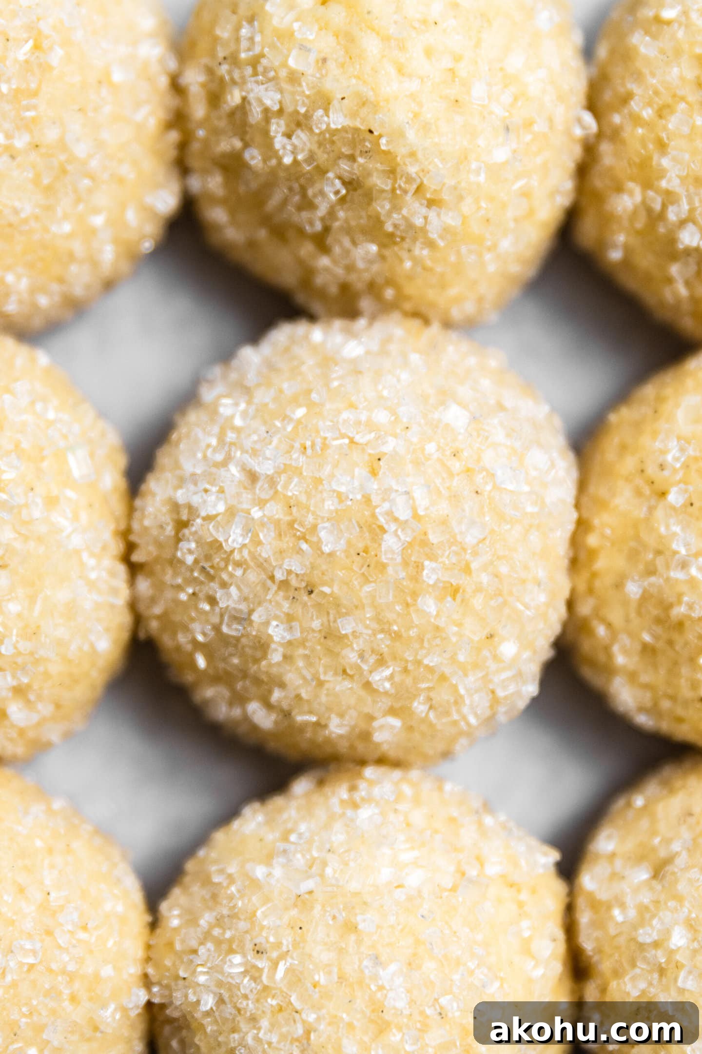 Drop-Style Vanilla Sugar Cookies: Quick Classic Recipe 8 Close up of sugar cookie dough balls rolled in sparkling sugar.