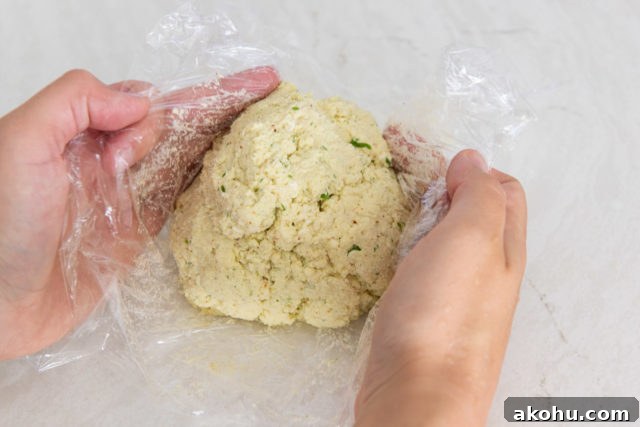 Everything Bagel Cheese Ball Recipe for Parties and Snacks 8 Shaping the Cheese Ball Recipe Mixture Using Plastic Wrap