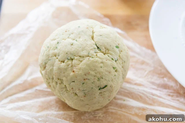 Everything Bagel Cheese Ball Recipe for Parties and Snacks 10 Refrigerated Firm Cheese Ball on Plastic Wrap