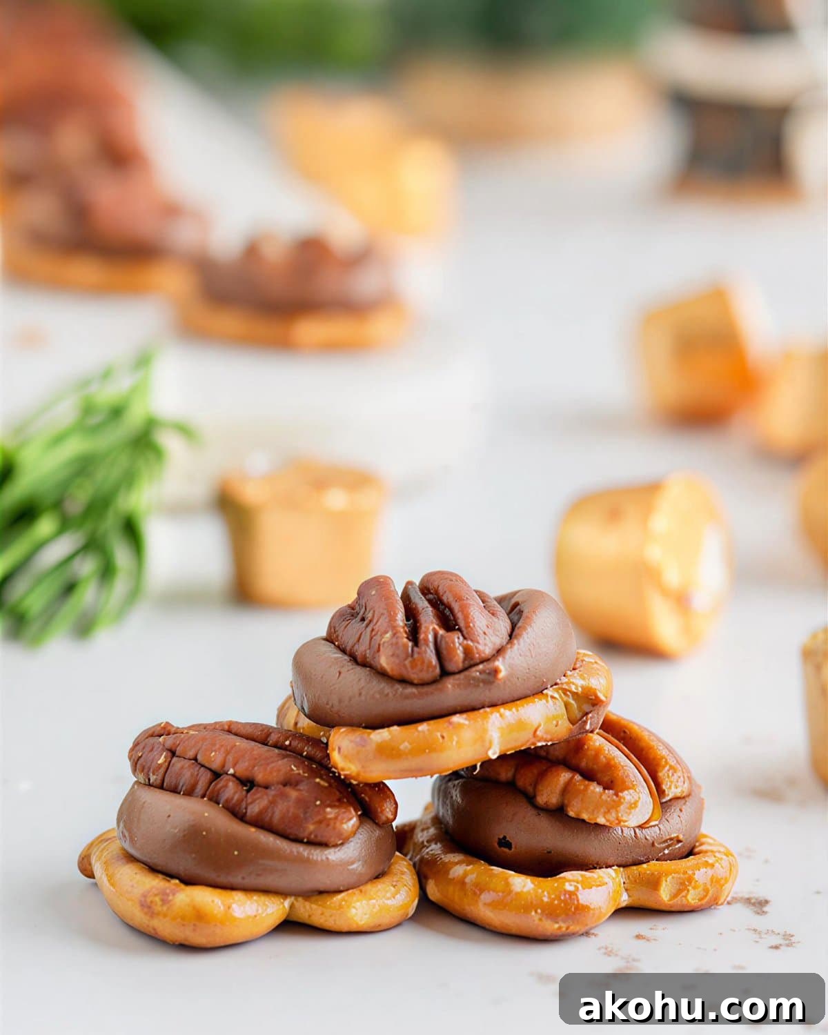 a pyramid of 3 rolo pretzel turtles.