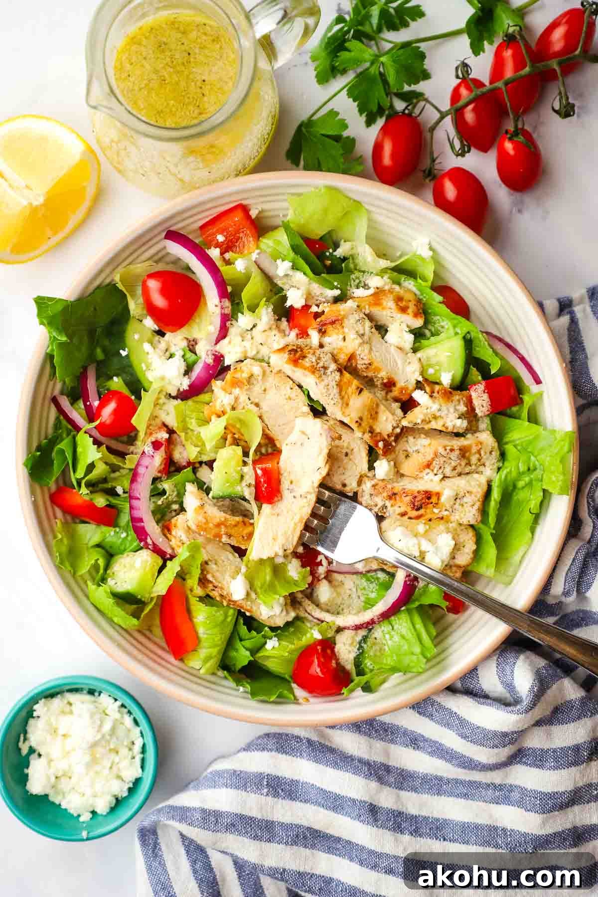 Greek Chicken Salad with Feta, Olives & Lemon Vinaigrette 2 an overhead view of greek chicken salad on a plate
