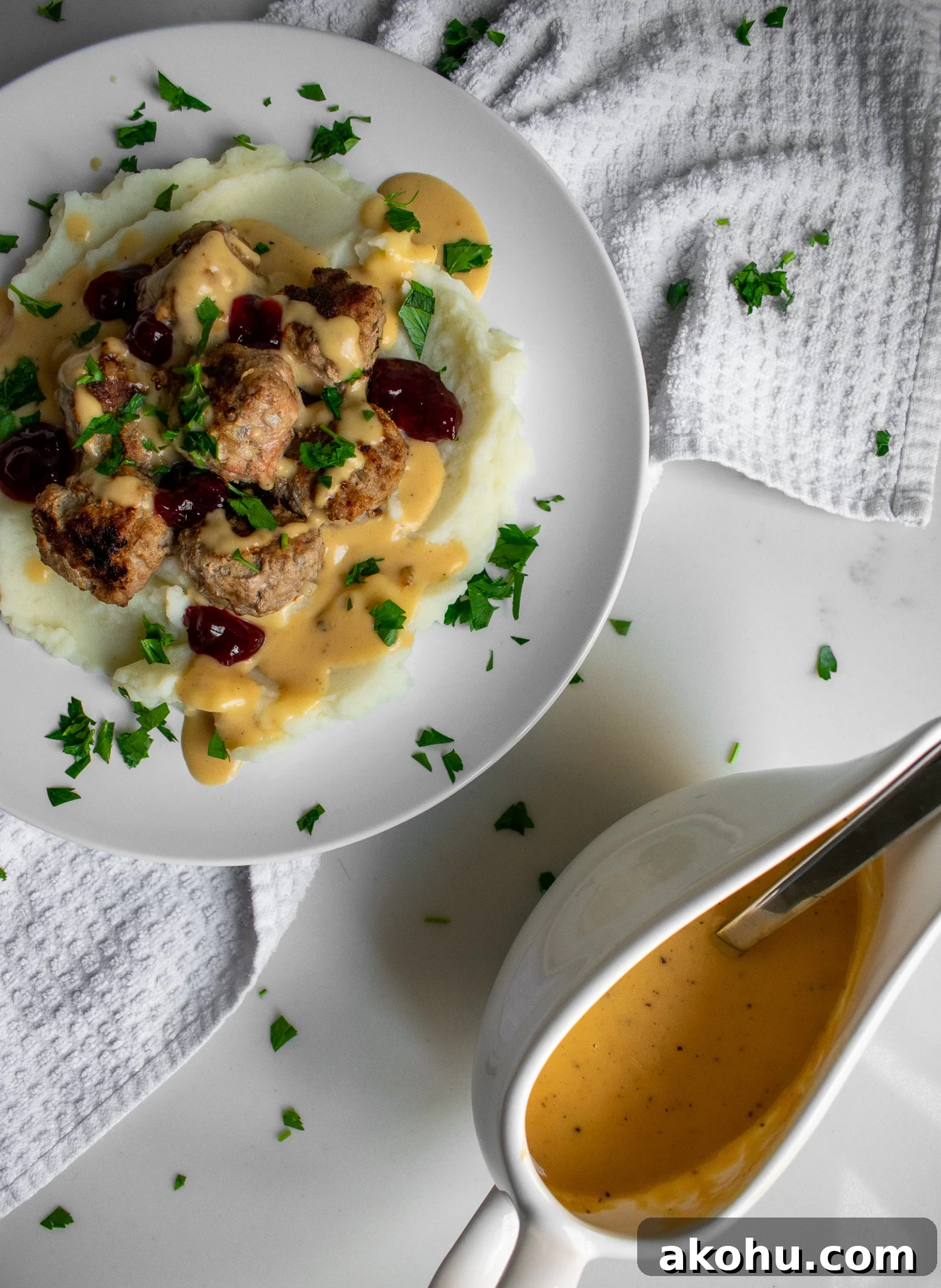 Swedish meatballs with mashed potatoes, gravy, and lingonberry jam.