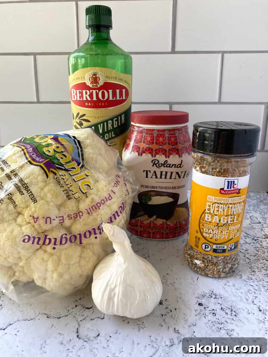 Cauliflower hummus ingredients on a counter.