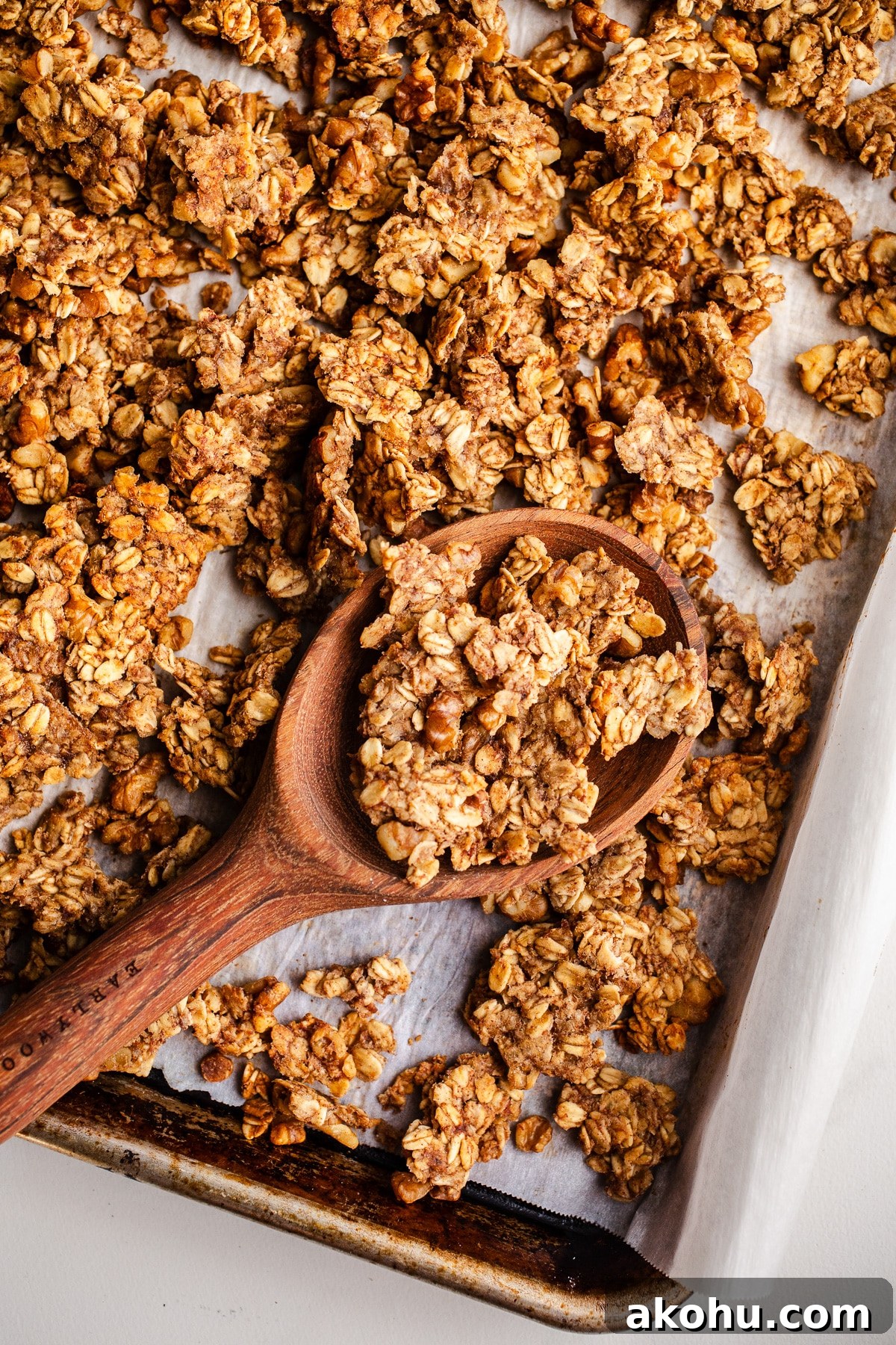 Banana Bread Granola Recipe: Crunchy, Cinnamon-Maple Cluster 2 Granola in a baking pan.