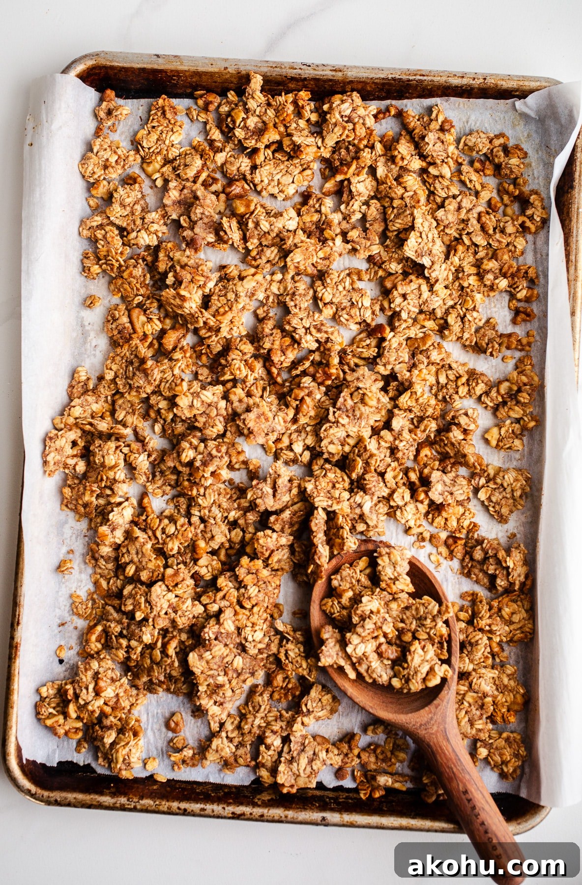 Banana Bread Granola Recipe: Crunchy, Cinnamon-Maple Cluster 9 Banana bread granola in a baking pan.