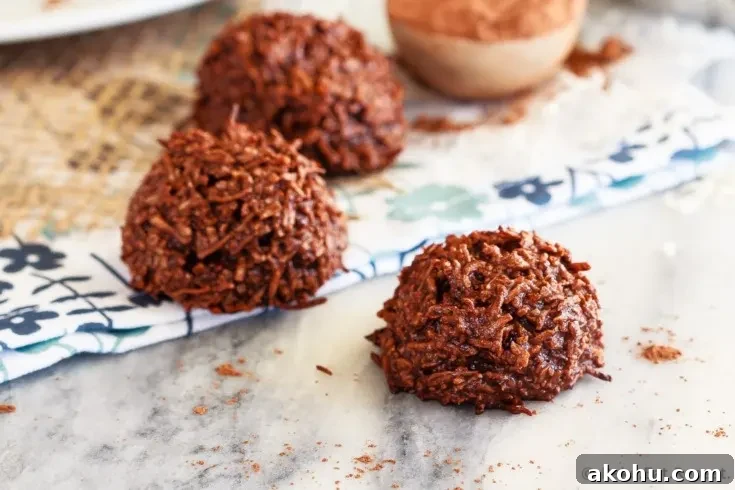 Chocolate Coconut Macaroons - These chocolate coconut macaroons are super fast to make, only have 5 ingredients, and mix up in minutes. Plus, they taste fantastic!
