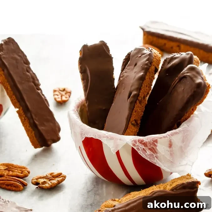 These easy to make pecan chocolate chip cookie dunkers are like biscotti - a crisp chocolate chip cookie that you can easily dunk in your milk or coffee!