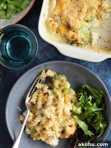 A bowl of chicken broccoli pasta bake.