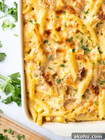 Tuna pasta bake in a white baking dish.