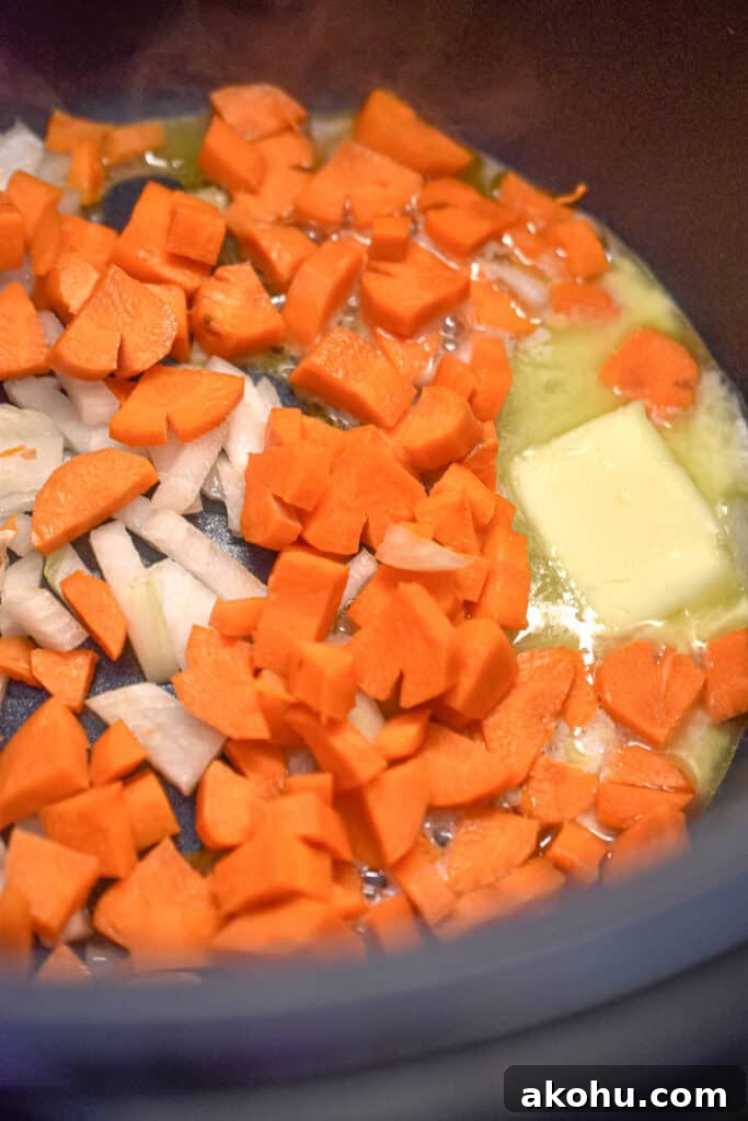 The onions and carrots are sautéed in the Instant Pot