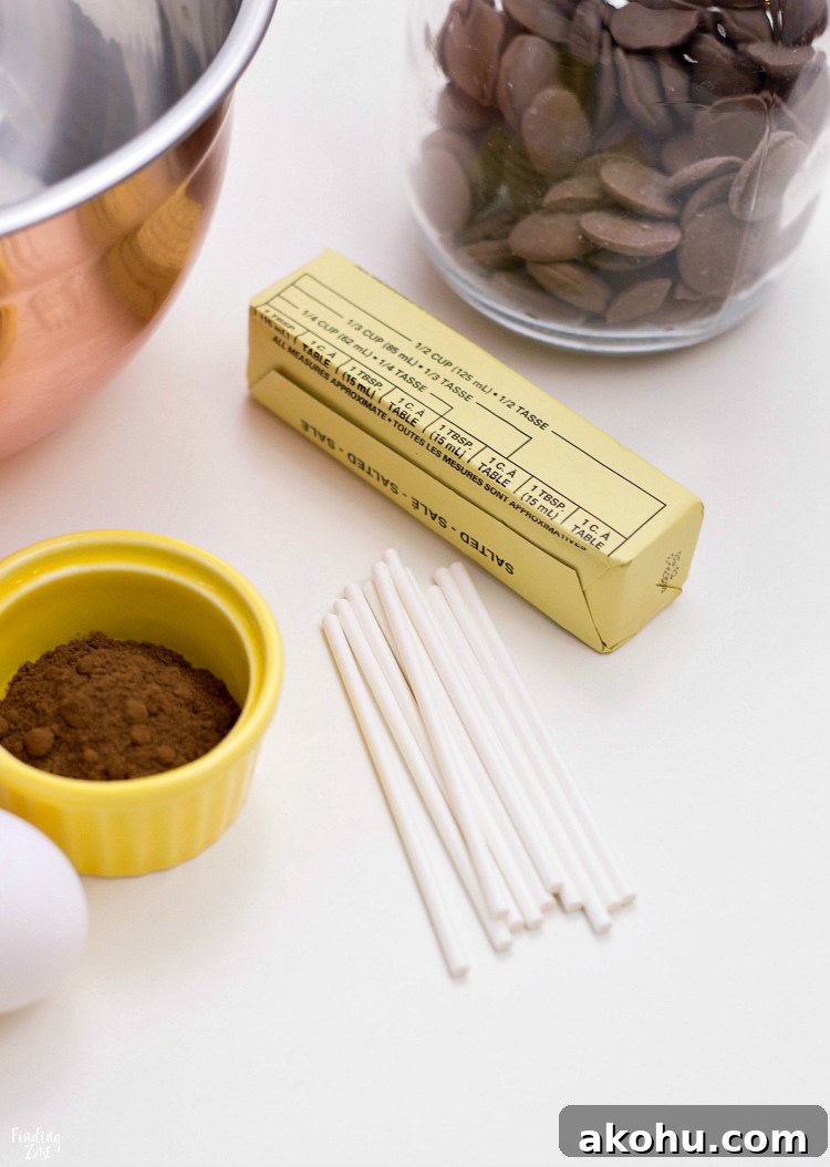 These gingerbread cake pops are sure to bring smiles this holiday season! Made from homemade gingerbread cake, these cake pops feature a sweet gingerbread man face that is as fun as it is delicious! This recipe makes a great Christmas dessert for all ages.