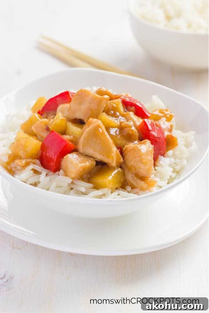 Super easy slow cooker dinner for those busy nights! Skip take out and make this Crockpot Sweet & Sour Chicken Recipe instead!
