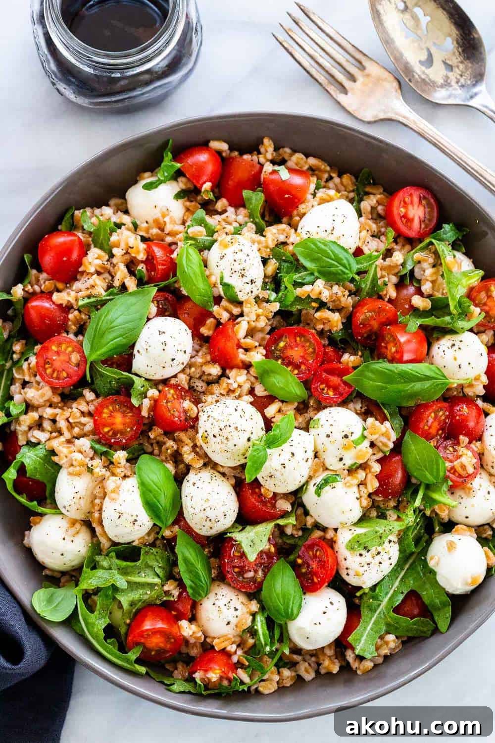 Farro Caprese Salad mixed together in a bowl