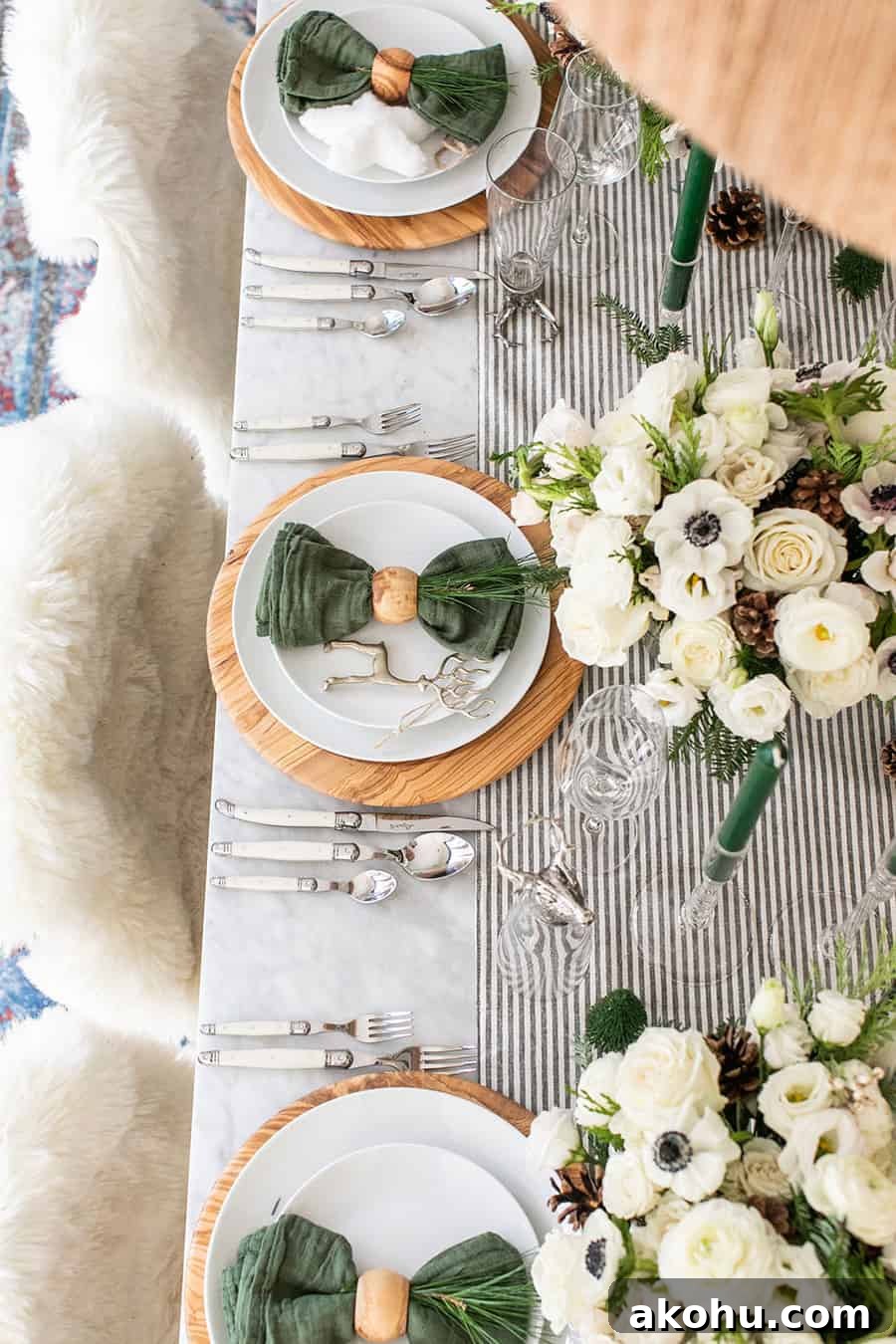 A table filled with Christmas table decorations. 