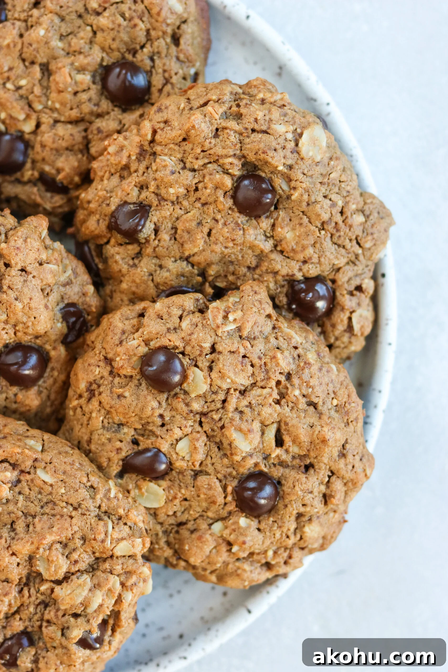 gluten free almond butter chocolate chip oatmeal cookies on a plate