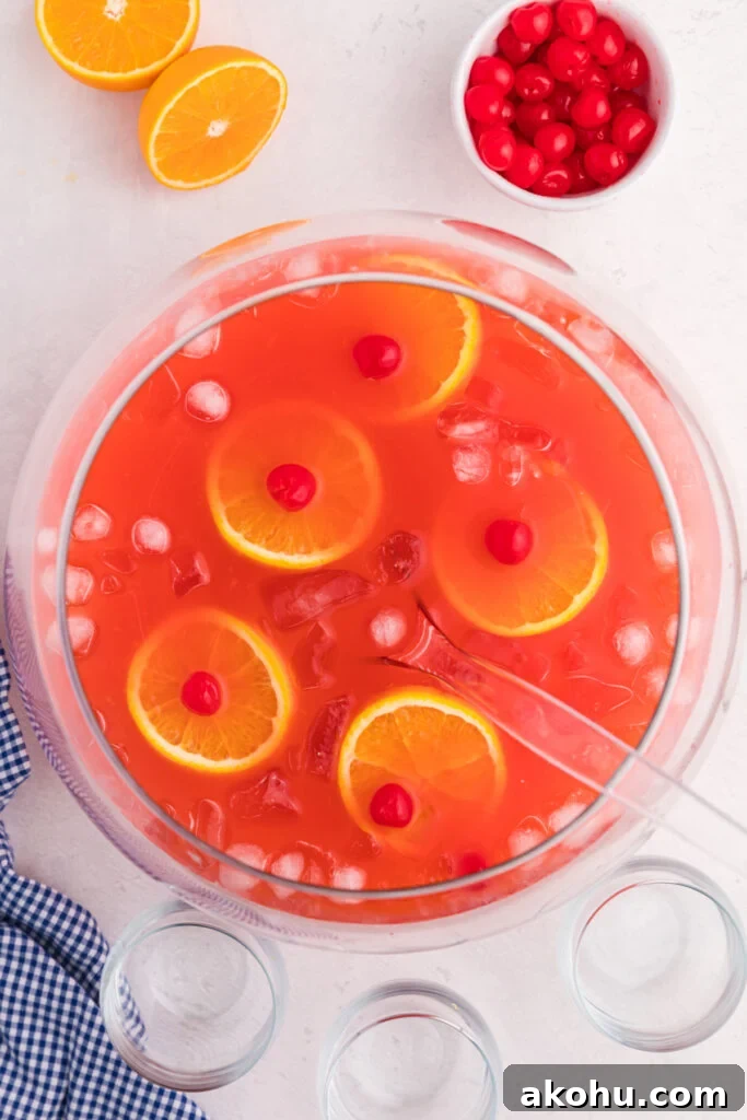 Shirley Temple Punch Recipe: Classic Fizzy Mocktail Guide 4 looking down into a punch bowl with shirley temple punch