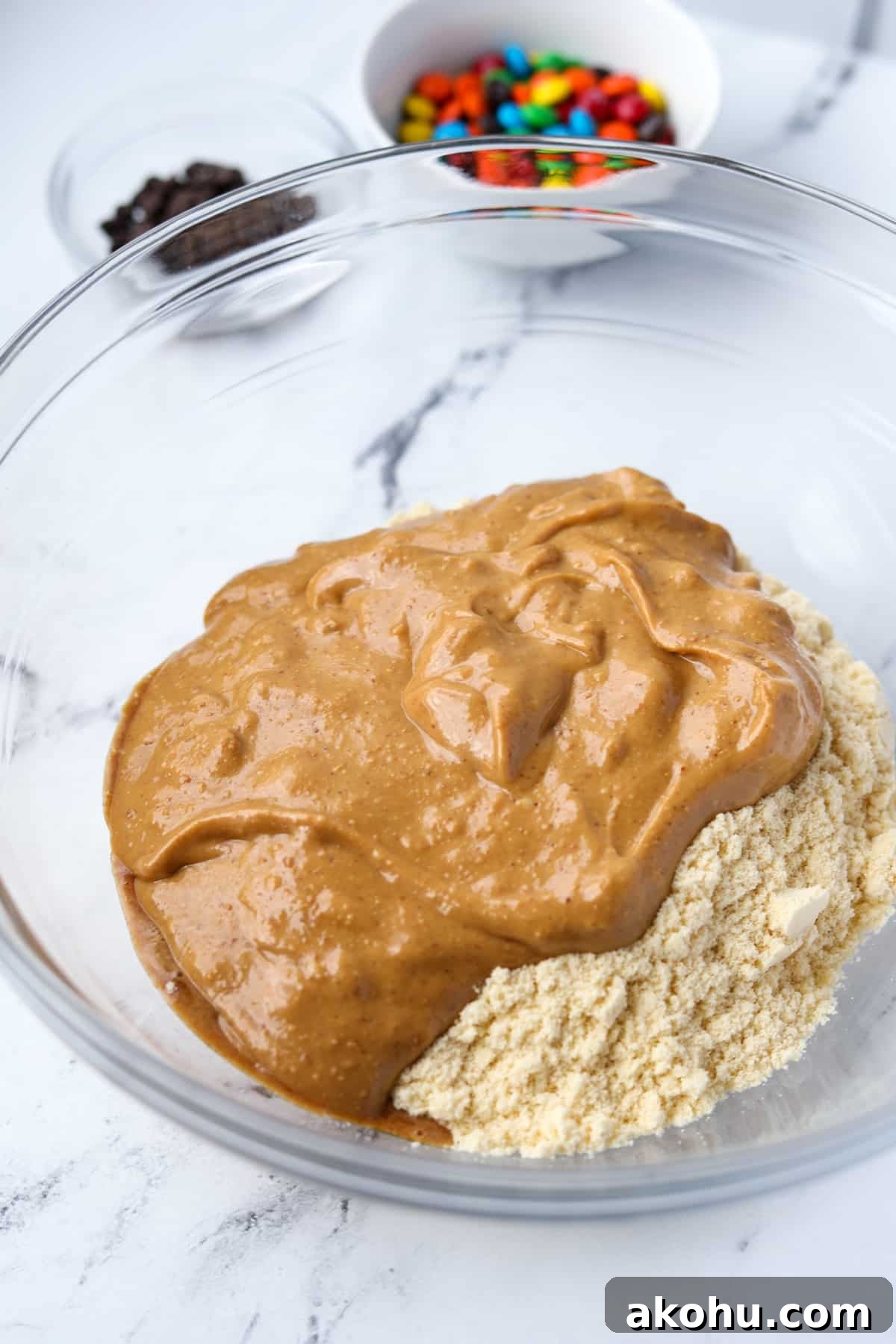 Monster Cookie Protein Bars: Chewy Peanut Butter Oat Bars 4 A bowl with oat flour, peanut butter, and protein powder.