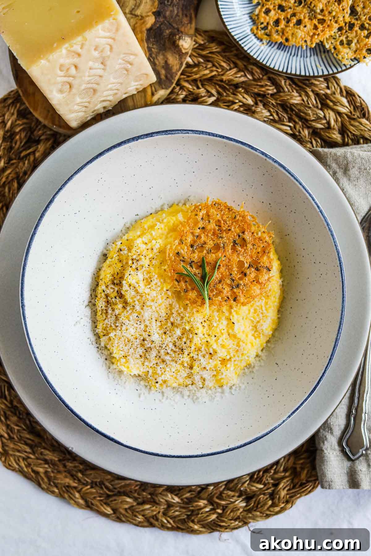 20 Delicious Side Dishes to Serve with Roasted Chicken 12 Creamy polenta with parmigiano-reggiano, rosemary, and frico (montasio cheese crisps) in a bowl.